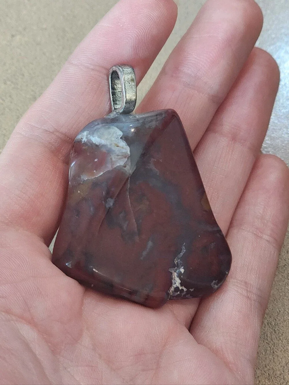 Polished Brown Stone Pendant with Silver Bail